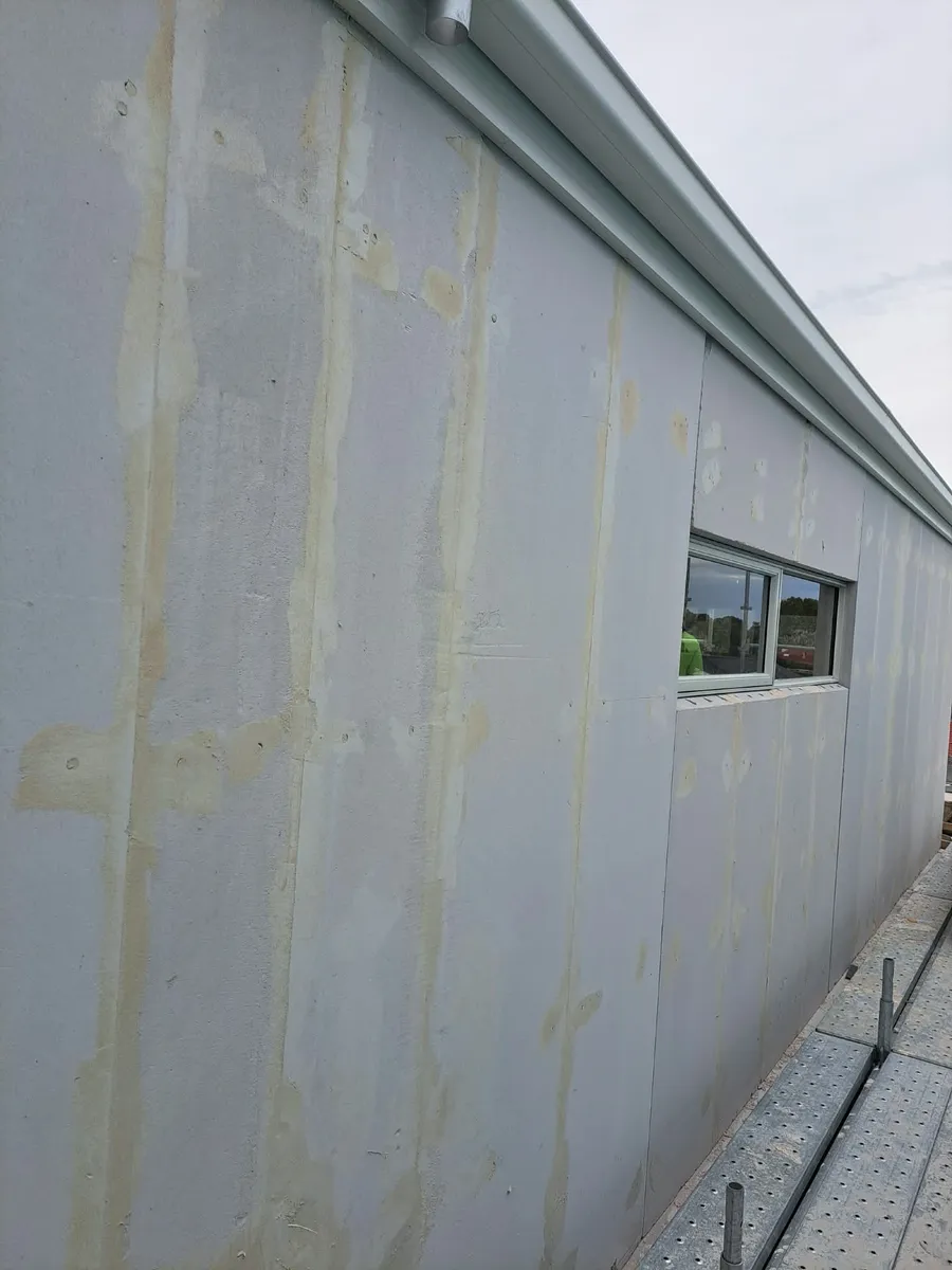 Ichiban Cladding crew installing Hebel panels on site